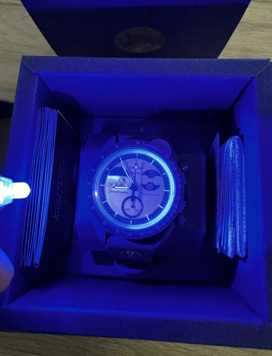 MOONSWATCH MISSION TO EARTHPHASE - MOONSHINE GOLD - SWATCH X OMEGA BIOCERAMIC